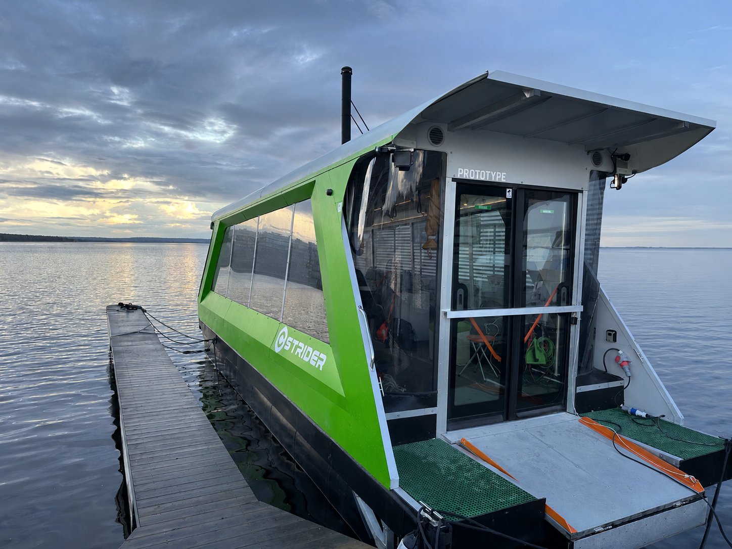 Green Cstrider seen from behind at the dock